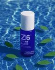 trattamento antiforfora cute Napura Z6 Active spray 50ml in acqua blu con foglie jojoba